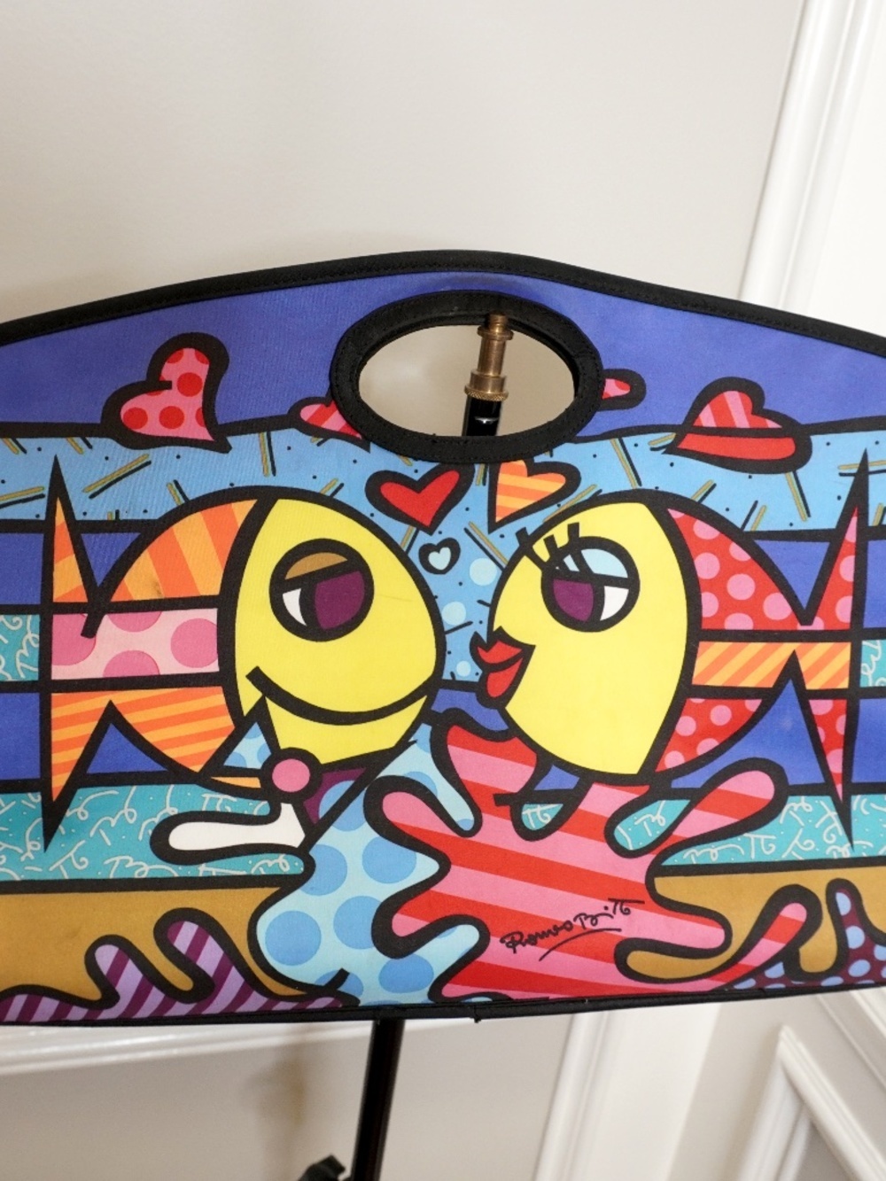 Romero Britto "Deeply in Love" tote bag featuring vibrant pop art of kissing fis